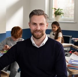 Maplewood male educator in a classroom